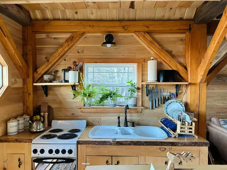 Tiny wooden cabin kitchen